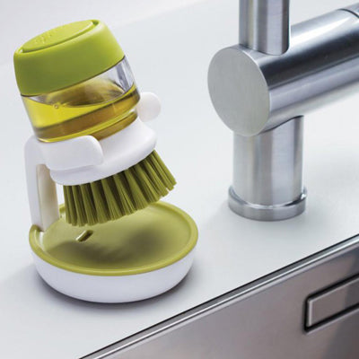 Cepillo con dispensador verde - Joseph Joseph