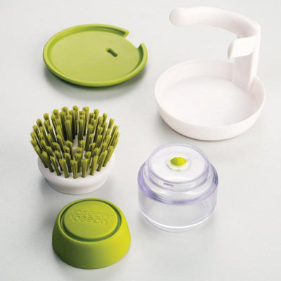 Cepillo con dispensador verde - Joseph Joseph